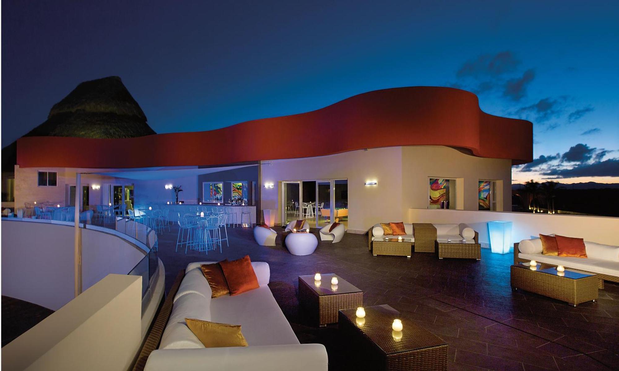 Breathless Punta Cana Resort & Spa (Adults Only) Kültér fotó Rooftop bar at the Hard Rock Hotel